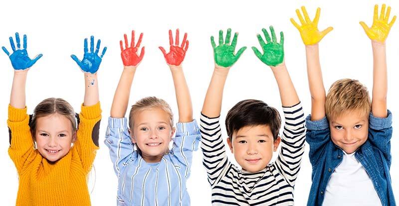 four children with hands painted in colors blue, red, green, and yellow - matching the colors of the four temperaments