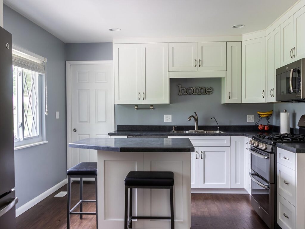 kitchen with white cabinets and gray counters